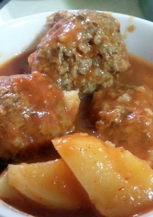 A picture of albondigas en chipotle sauce (spicy meatballs soup).