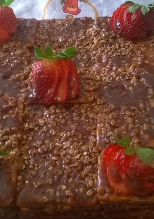 Una foto de Torta de galletitas de agua, chocolate y avena 