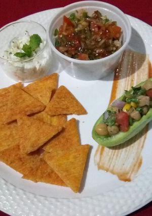 A picture of Tangy Salsa with multi grain nachos.