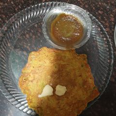 A picture of Besan Chilla loaded with vegetables.