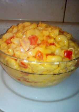 A picture of Elbow Pasta with Nacho Cheese and Red Bell Pepper.