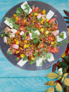 A picture of Healthy Paneer salad with sprouts.