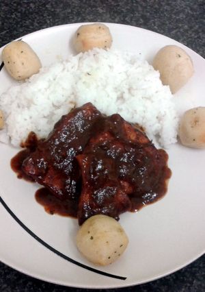 A picture of BBQ smoky pork with salted rice (serve with garlic & herb doe balls optional).