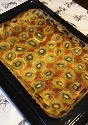 Une photo de Tarte aux kiwis et noix de coco (pâte brisée à la banane)