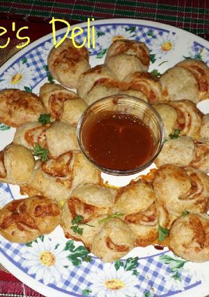 Una foto de Rosca de pizza roll