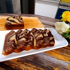 A picture of Eggless Vanilla -Chocolate Marble Cake.