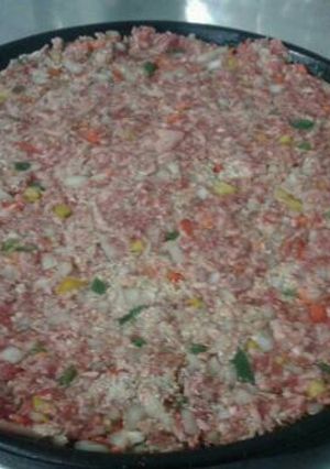Una foto de Hamburguesa gigante a la pizza