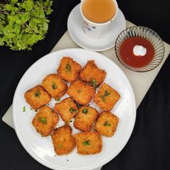 A picture of Crispy Corn Cheese Nuggets.