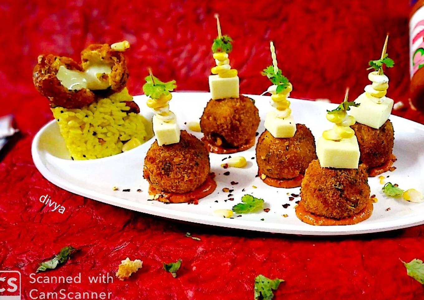 Puliyogare cheese burst bombs in pizza sauce
