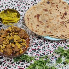 A picture of Broad beans and Methi Muthiya Curry (sabji).