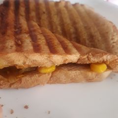 A picture of Cheese corn sandwich.