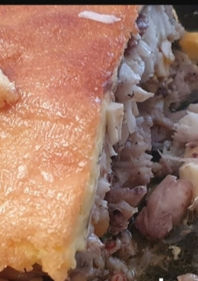 Una foto de Merluza rellena con costra de mahonesa