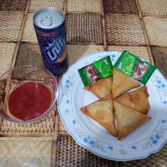 Chicken vegetable samosa A picture of Chicken vegetable samosa.