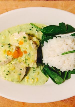 A picture of Chicken Breast with Corn and Spinach Cream.