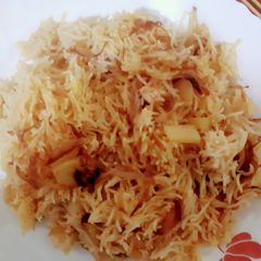 Onion potatoes pulav A picture of Onion potatoes pulav.
