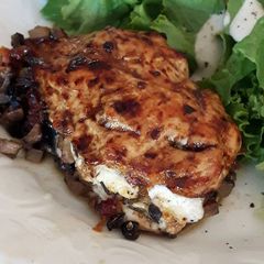 A picture of Mediterranean stuffed chicken breasts.