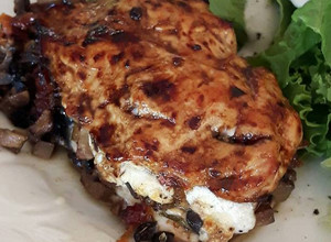 A picture of Mediterranean stuffed chicken breasts.