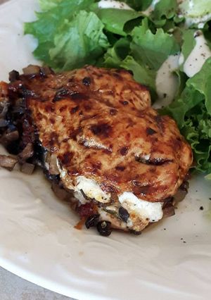 A picture of Mediterranean stuffed chicken breasts.