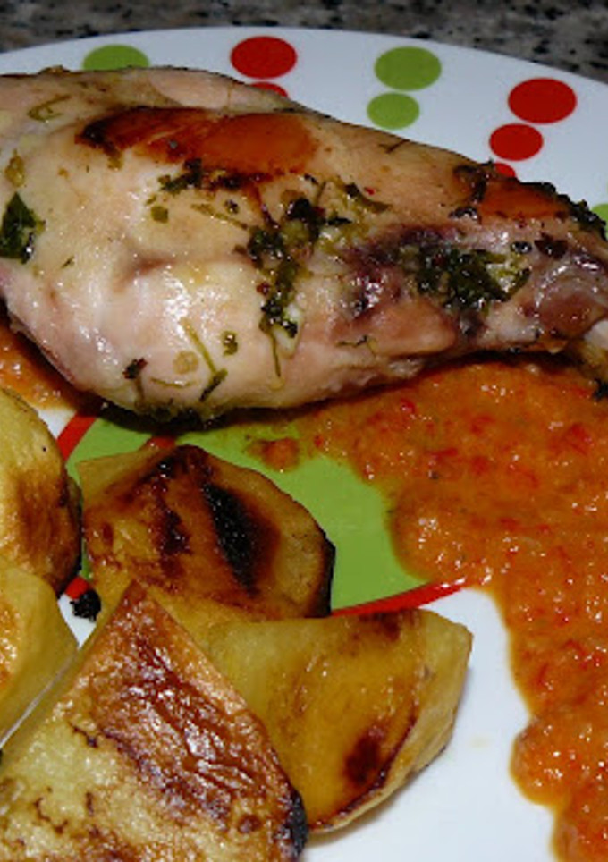 Una foto de Conejo adobado con salsa de pimientos