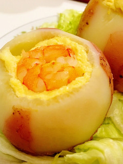 A picture of Savory steamed egg custard with shrimp in radish cup.