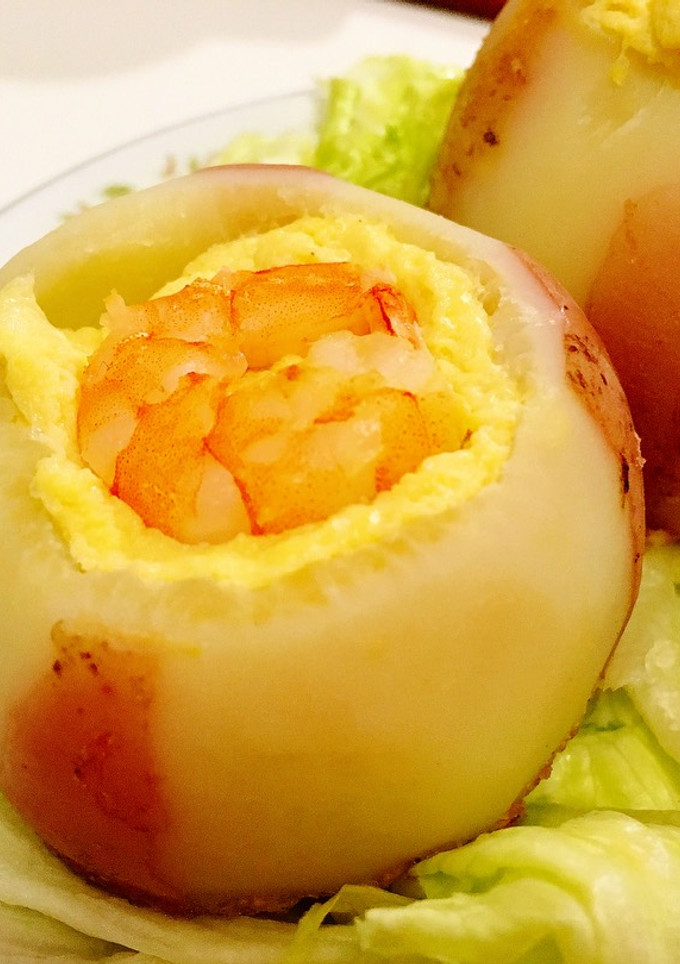 A picture of Savory steamed egg custard with shrimp in radish cup.