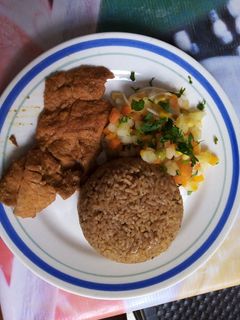 Una foto de Cerdo en salsa con arroz de coco