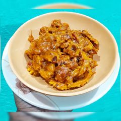 A picture of Karela sabzi / bitter gourd curry.