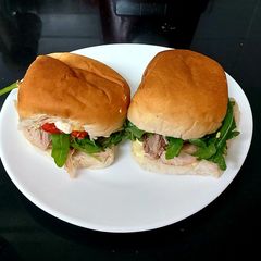 A picture of My Roast Pork & Dijon Mustard Barms with wild Peppery Rocket. 🥰.