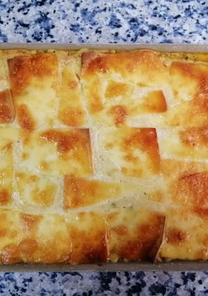 Una foto de Moussaka a cuatro manos