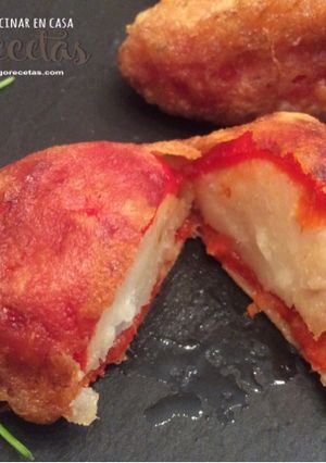 Una foto de Pimientos del piquillo rellenos de brandada de bacalao