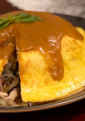 A picture of Stir-Fried Mixed Vegetables with Egg Crepe and Curry Sauce.