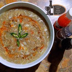 A picture of Desi chicken corn soup.