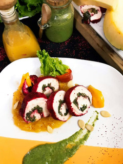 A picture of Sumac Chicken Roulade In Pumpkin Puree.