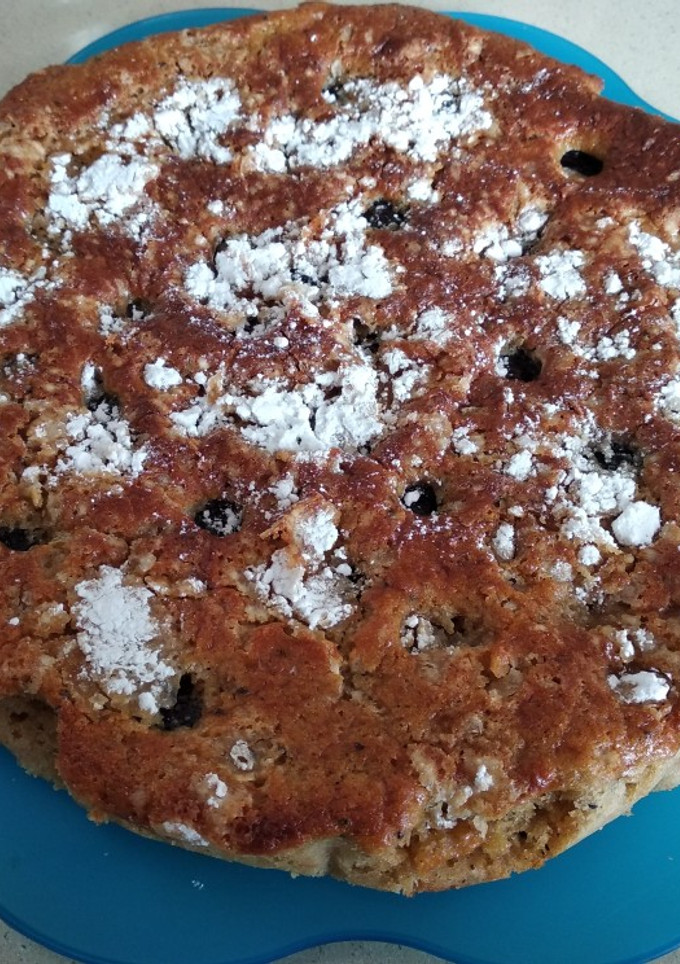 Una foto de Tarta de arándanos con café y kiwi