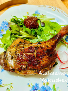A picture of Duck legs in soy and honey sauce.