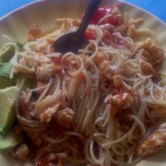 A picture of Sphaggetti with avocado and eggs.