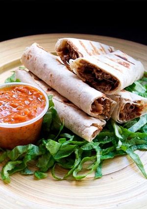 Una foto de Burritos de Cordero a la Cerveza Negra