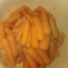 A picture of Tender Baby Carrots Optional: Honey butter glazed.