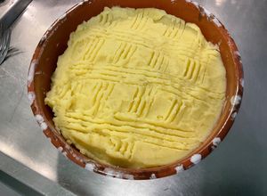 Une photo de Purée de pommes de terre à l’ail, crème et gingembre