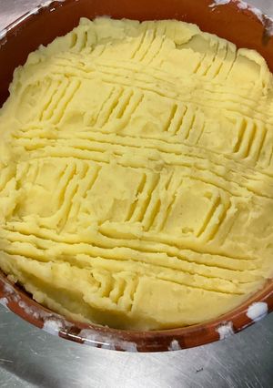 Une photo de Purée de pommes de terre à l’ail, crème et gingembre