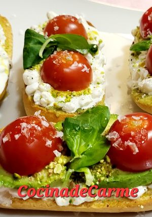 A picture of Toasts with Cottage Cheese, Cherry Tomatoes, Guacamole, and More.