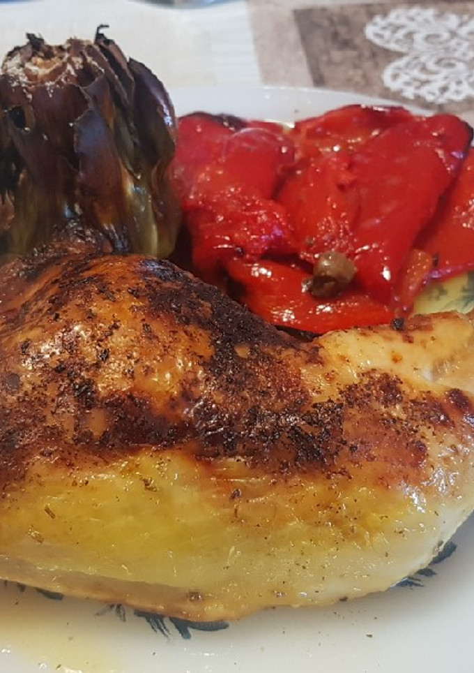 Una foto de Pollo al horno con alcachofas