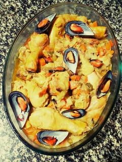 Una foto de Pollo con mejillones