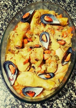 Una foto de Pollo con mejillones
