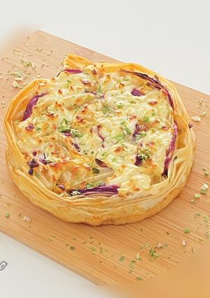 A picture of Filo Tart with Goat Cheese and Red Onion.