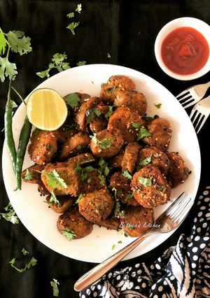 A picture of Mixed Veg. Muthia (Steamed Veggie Dumplings - Gujarati Style).