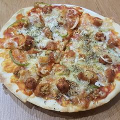 Thin Crust Seekh Kabab pizza A picture of Thin Crust Seekh Kabab pizza.