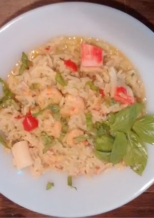Una foto de Risotto de calamar y kanikamas