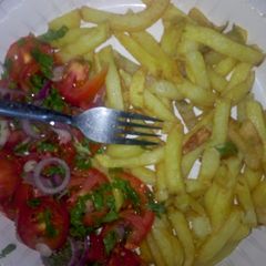 A picture of Chips with Kachumbari.