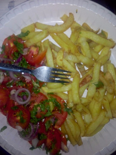 A picture of Chips with Kachumbari.